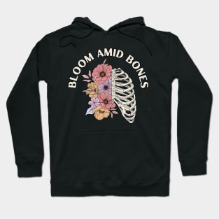 Bloom Amid Bones, skeleton chest, flowers Hoodie